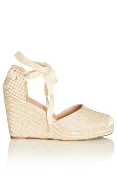 Take your trans-seasonal wardrobe to new heights with the beautiful Sage Wedge! Featuring a wide fit, cushioned sole with a rounded toe and a woven espadrille wedge heel, this shoe is a comfortable and versatile footwear essential that can take you from brunches to dinners out. Key Features Include: - Wide fit - Cushioned sole - Rounded, closed-toe - Woven espadrille wedge heel - Heel support - Self-tying ankle strap Wear this beautiful wedge with a pair of mid-wash denim jeans and a matching sh Seasonal Wardrobe, Shoes Heels Wedges, Leggings Sale, Grad Dresses, Espadrille Wedge, Leather Shops, City Chic, Espadrilles Wedges, Wedge Heels