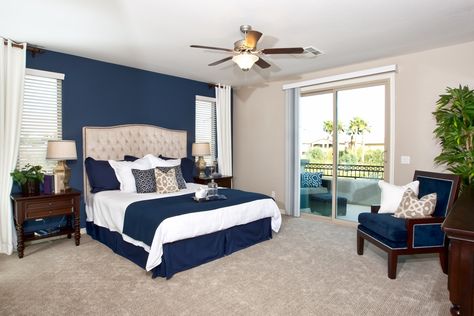 Tipping the scale in the darker side for the nautical color scheme, we have the master bedroom of our 3,285 sq. ft. plan at our Catalina community. Navy And Tan Bedroom, Nautical Bedroom Colors, Room Paint Ideas, Tan Bedroom, Nautical Decor Bedroom, Bedroom Decorating Tips, Tan Walls, Nautical Bedroom, Beautiful Bedrooms Master