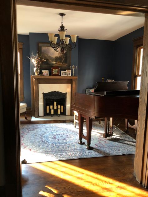 Music Room With Fireplace, Valspar Motor City Blue, Piano Parlor Room, Victorian Piano Room, Music Room Color Ideas, 1910s Living Room, Motor City Blue Valspar, Dark Blue Victorian Living Room, Piano In Library