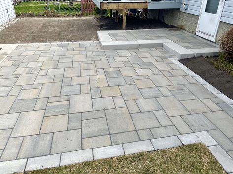 We used Techo Bloc Blu60 Smooth in Champlain Grey, with a Raffinato Step and matching Greyed Nickel border. #patio #patioideas #patiodesign #pavingstones #landscaping #patiolife #hardscaping #hardscape Patio Patterns, Paver Patio Ideas, Stone Patio Designs, Belgard Pavers, Pavers Backyard, Paver Designs, Brick Patio, Walkway Landscaping, Patio Pavers Design