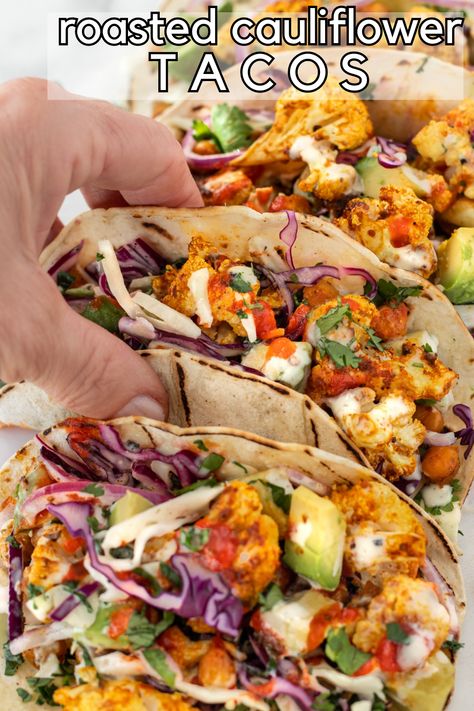 Quick and easy roasted cauliflower and chickpea tacos with crunchy slaw and creamy avocado. Ready in 20 minutes, everyone loves this vegan taco recipe! Vegan Cauliflower Tacos Recipes, Greek Cauliflower Tacos, Cauliflower Taco Recipes, Chickpea Tacos Recipes, Chickpeas Tacos, Cauliflower Tacos Recipes, Cauliflower Tacos Vegan, Vegetarian Taco Recipes, Roasted Cauliflower Chickpea