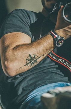 30 Cool Forearm Tattoos for Men - The Trend Spotter Compass Tattoo Men, Pola Tato, Compass Tattoo Design, Map Tattoos, Tattoo Trend, Cool Forearm Tattoos, Tato Lengan, Cat Tattoos, Tiny Tattoo