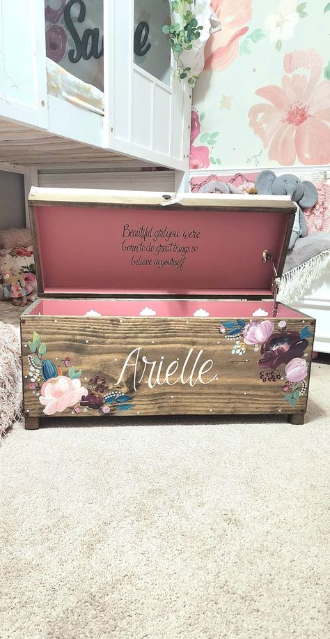 "DESCRIPTION:  This is a 32\" toy chest a 24\" rolling toy box or our new XL 38\"  Chest that can be personalized with the child name.  * The name is done in powder pink    The lid quotes comes with the box. It says \"Beautiful girl you were born to do great things, so believe in yourself.  The toy box is shipped FULLY ASSEMBLED & is hand crafted & It has hand-painted floral and white polka dots on the front, and white clouds on the inside.   This is the magical and whimsical toy storage that yo Toy Chest Painting Ideas, Painted Toy Box Ideas, Diy Toy Box Ideas, Toy Box Design, Toy Box Diy, Toy Box Ideas, Personalized Toy Chest, Painted Toy Chest, Painted Toy Boxes