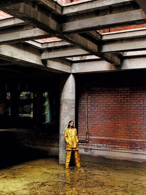 A fashion shoot against the backdrop of Ahmedabad's brutalist architecture | Architectural Digest India Brutalist Photoshoot, Blue Platform Shoes, National Institute Of Design, Architectural Fashion, Editorial Shoot, White Stripes Shirt, Brutalist Architecture, Photographs Of People, Brutalism