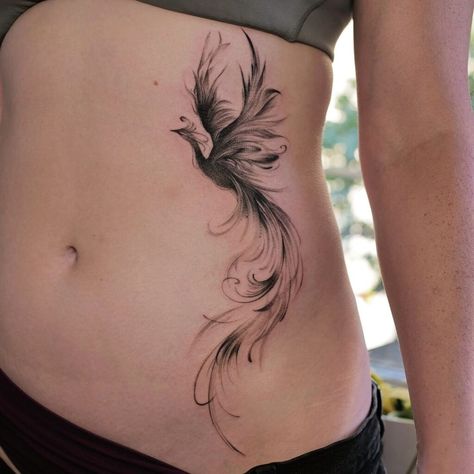 20 Phoenix Tattoos To Inspire Strength And Hope For Better Days Ahead Phoenix Tattoo Feminine The Ashes, Phoenix Tattoo Design Men, Phoenix Tattoo Design For Women, Unique Phoenix Tattoo, Phoenix Tattoo Back, Phoenix Tattoo Design Feminine, Explore Tattoo Ideas, Phoenix Tattoo Women, Phoenix Tattoo Arm