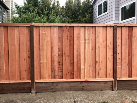 There are lots of options and components when it comes to wood fences. Besides styles and wood types, there are also choices like kickboards. Check out our post to see what a kickboard is, what it’s used for, and why you should have one. Bottom Fence Border, Bottom Fence Gap Filler Ideas, Gaps Under Fence Ideas, Bottom Of Fence Gap Ideas, Fence Styles Wood, Louisiana Landscaping, Fence Restoration, Vertical Fence, Beach Fence