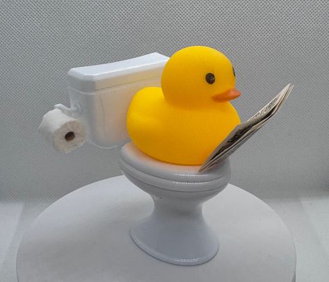 A fun addition to your duck collection. comes in 3 separate pieces, wet wipes do snap on to toilet, 2 in rubber duck reading his favorite book on a toilet What a fun gift these make to give As A gag gift to that special person. Duck colors may vary.  Show your deep interest in ducks and decorate your car or suv with this rubber duck. This toilet duck is the best decorative ornament and gives a luxurious touch.  Toilet  duck is lightweight and affordable toy and comes in various colors. This ador Funny Rubber Ducks, Rubber Duck Collection, Duck Merch, Rubber Duck Bathroom, Fun Toilet, Duck Bathroom, Duck Stuff, Duck Collection, Ducky Duck