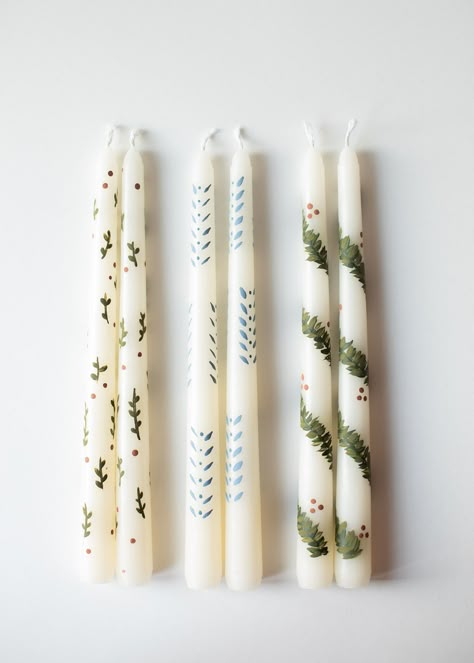 These are 10in hand painted tapered candles! These candles come in a set of 2 candles and are available in 3 different styles w/ gift wrapping included. These are great Christmas gifts for teachers or friends! Hand Painted Advent Candle, Diy Christmas Gifts Painting, Painted Candle Sticks Christmas, Thoughtful Homemade Christmas Gifts, Painting Tapered Candles, Holiday Candle Painting, Painted Candlesticks Diy Christmas, How To Hand Paint Candles, Scandinavian Xmas Decorations