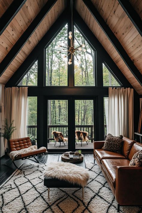 Mountain Airbnb Interior, Black Cabin Interior Design, A Frame Windows Living Room, Modern Alpine Cabin, Cabin Before And After, Cozy A Frame Cabin Interior, Painting Log Cabin Walls, Modern Cozy Cabin Interior, Updated Cabin Interior