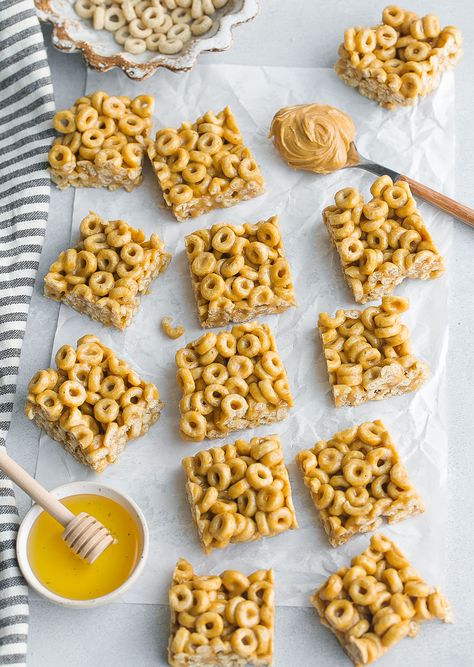 Peanut Butter Cheerio Bars are quick to make and kids will love this school snack. Made with pantry ingredients and is crunchy, gooey, and naturally sweetened. Everyone will enjoy these no bake cereal treats! Cheerios Recipes, Peanut Butter Cheerio Bars, Cheerio Bars, No Bake Peanut Butter, Pantry Ingredients, Cereal Treats, Peanut Butter Honey, School Snack, Bark Recipe