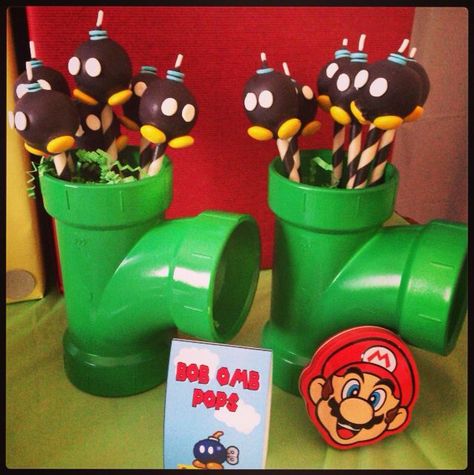 Gamer Party Food Ideas, Mario Themed Party Games, Supermario Theme Party, Super Mario Bros Party Ideas Food, Mario Party Food Ideas, Mario Themed Food, Super Mario Cake Pops, Mario Cake Pops, Super Mario Party Food