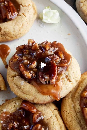 Pecan Pie Cookies | Pecan Pie Cookies | By Food Dolls | You're going to love these
pecan pie cookies. First you're going to start off by making
your cookie dough and then your pecan pie filling which is only
four ingredients. Butter, brown sugar, heavy cream, and some
pecans. You're going to bake your cookie and right when it
comes out, you're going to press down the center and use
that ooey gooey sauce. And then top it with a little bit of sea
salt and your golden. Yes. Biscochito Recipe, Pecan Pie Cookies Recipe, Caramel Pecan Cookies, Pecan Pie Cookies, Chewy Gingerbread Cookies, Food Dolls, Pecan Pie Easy, Pecan Pie Filling, Pie Cookies