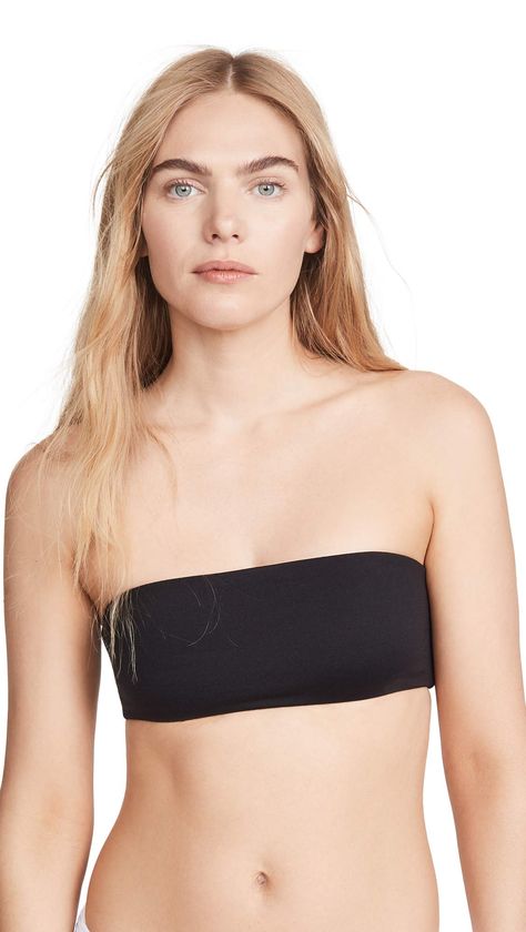 PRICES MAY VARY. Double-layered Strapless silhouette Bandeau top A smooth Top Secret bra with a simple bandeau silhouette. Tube Bra, Koral Activewear, Sheer Clothing, Top Strapless, Lace Bandeau, Bandeau Bra, Hair Color Ideas For Brunettes, Norma Kamali, Top Secret