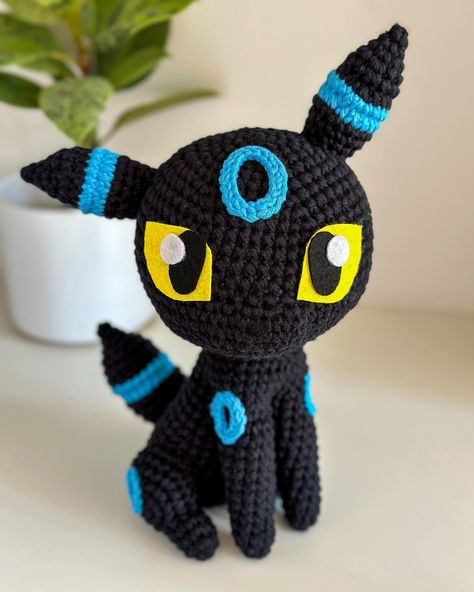 Gotta catch ‘em all! 💫 This chubby shiny Umbreon appeared in my work room recently 🤩 Are you a Pokémon fan? ✦ Pattern: Chibi Umbreon by @1upcrochet Made with @scheepjes Cahlista #pracowniablask #crochet #häkeln #szydełkowanie #amigurumi #umbreon #pokemon #1upcrochet amigurumi • crochet • doll • handmade • szydełkowanie Crochet Eevee Evolutions, Umbreon Crochet Pattern, Crochet Vaporeon, Chibi Umbreon, Crochet Umbreon, Shiny Umbreon, Umbreon Pokemon, Crochet Pokemon, Fan Pattern