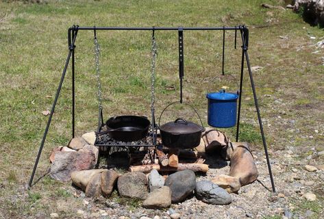 Folding Campfire Dutch Oven Cooking Grill plus other open fire cooking ideas - gardenista.com Campfire Grill, Fire Pit Cooking, Open Fire Cooking, Outdoor Cooking Area, Dutch Oven Cooking, Camping Grill, Wood Plant Stand, Cooking Supplies, Fire Pit Designs