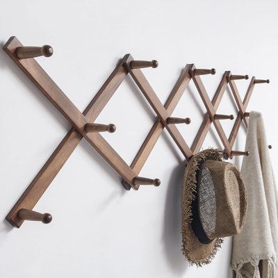 Features:Solid wooden accordian wall hanger with lots of pegs, 14 pegs hooks, smooth surface finish. Solid accordion hat rack with 16 peg hooks for hanging baseball caps, hats, coffee mugs, belts, coats, dog leashes, etc. This decorative wooden coat rack hanger is perfect for organizing any entranceway, hallways, foyer, kitchen, living room, bathroom, bedroom or closetGood choice for room that needs a little extra space or organizationGood choice for room that needs a little extra space or organ Backpack Rack, Wall Mounted Hat Rack, Wall Hat Racks, Wall Hats, Hanging Hats, Hanger Organizer, Hat Hanger, Business Decor, Hat Rack