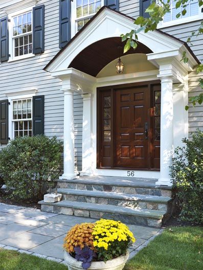 Someday!  Want to add a portico to break up front exterior lines.  Vault it so we can hang an awesome light too. Front Door Roof Overhang Entryway, Colonial Front Door Ideas, Colonial Front Door, Portico Entry, Front Door Overhang, Veranda Design, Door Overhang, Portico Design, Colonial House Exteriors