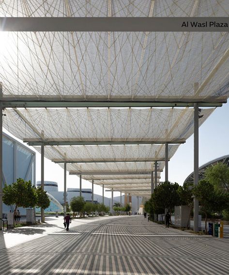 an ethereal canopy of high-tech i-Mesh floats above expo 2020 dubai Architectural Canopy, Tensile Canopy, Shading Structure, Canopy Structure, Design Creative Ideas, Floating Canopy, Modern Canopy, Expo 2020 Dubai, Canopy Ideas