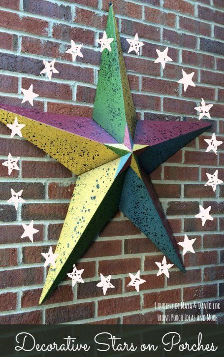 We like this colorful metallic star on Maya and David's porch. Do you know the meaning behind these stars? We did a little research on this topic! Found at Front-Porch-Ideas-and-More.com Metal Stars Decor, Primitive Country Homes, Front Door Paint Colors, Outdoor Metal Wall Art, Stars Wall Decor, Front Porch Design, Porch Wall, Metal Barn, Metal Star