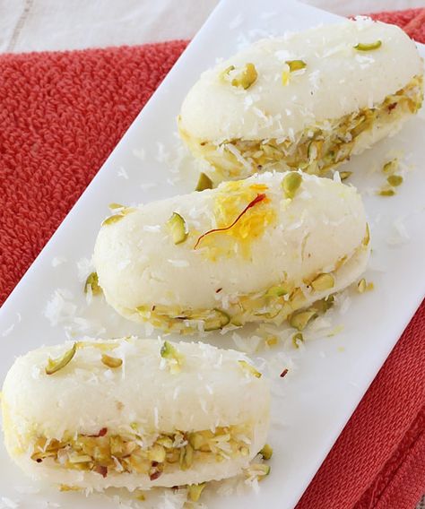 Bengali Cham Cham  with Stuffed with Mawa (Khoya) and Dryfruits - Delicious Indian Dessert -  Step by Step Recipe Cham Cham Sweet, Indian Deserts, Indian Mithai, Durga Pooja, Green Cardamom, Lemon Bar, Desiccated Coconut, Indian Dessert, Indian Dessert Recipes