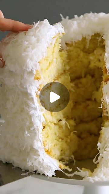 Martha Stewart on Instagram: "This cake is a coconut lover’s dream. It’s a towering creation of six tender cake layers sprinkled with shredded coconut and filled with a rich coconut custard. Frosted with mountains of billowy seven-minute frosting, it becomes even taller. Make it for a special occasion—there’s nothing better for a coconut fan than this showstopping confection. Get the recipe at the link in our bio." Tender Coconut Cake Design, Seven Minute Frosting, Coconut Custard, Cake Layers, Slices Recipes, Coconut Cake, April 29, Shredded Coconut, Dream It