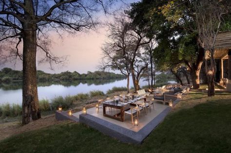 Nestled on an exclusive stretch of the Zambezi River, the exquisite Matetsi River Lodge offers the unique experience of rich views of wildlife as well as captivating experiences of the Victoria Falls. It celebrates the region's fascinating heritage with authentic features and effortlessly... Safari House, Lakeside Cafe, River Restaurant, Resort Design Plan, Lakeside Restaurant, Open Restaurant, Hotel Garden, Lodge Design, Outdoor Restaurant Design