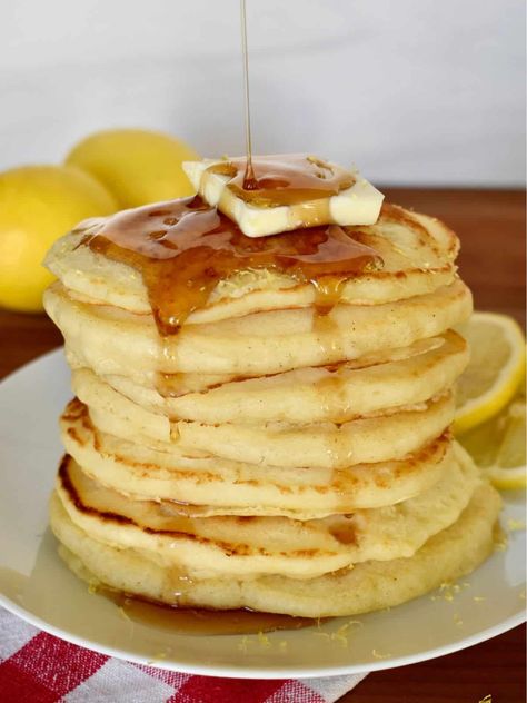 Lemon Ricotta Pancakes with Pancake Mix are a delicious breakfast or brunch treat that combines the tanginess of lemon with the creaminess of ricotta cheese. Here, they are even easier to make using store-bought or homemade pancake mix. Homemade Pancake Mix, Lemon Pancakes, Light And Fluffy Pancakes, Candied Lemon Peel, Lemon Ricotta Pancakes, Pancake House, Ricotta Pancakes, Ricotta Cake, Lemon Ricotta