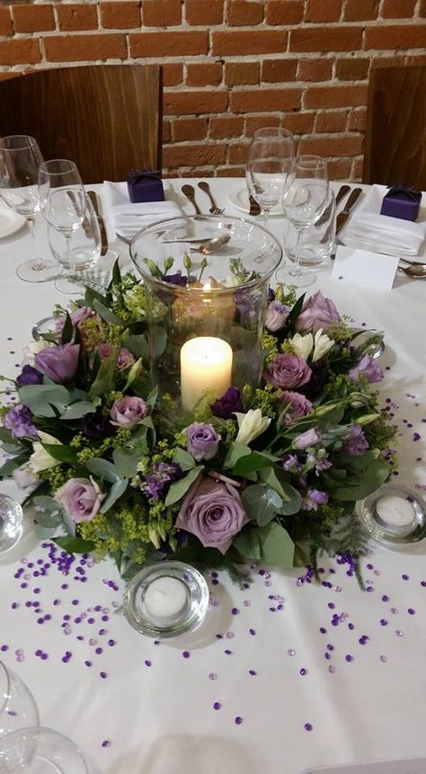 Purple Flower Centrepiece, Lilac And Gold Centerpieces, Lilac Purple Centerpieces, Purple Themed Centerpieces, Sage Green And Purple Wedding Centerpieces, Purple And Green Table Decorations, Lavender And Sage Reception, Lilac And Sage Centerpieces, Sage And Lilac Quince