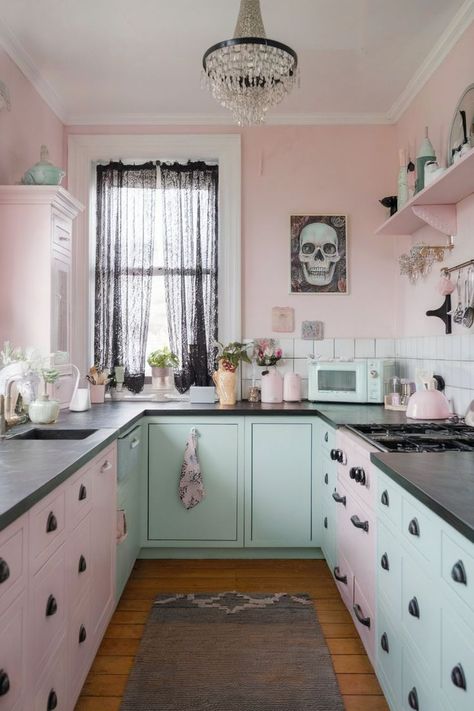 A pastel goth kitchen with pink and mint green cabinets, a skull painting, and a crystal chandelier. Goth Kitchen Ideas, Pastel Goth Home, Goth Kitchen Decor, Goth Kitchen, Elegant Goth, Pastel House, Punk Aesthetic, Aesthetic Kitchen, Kitchen Aesthetic