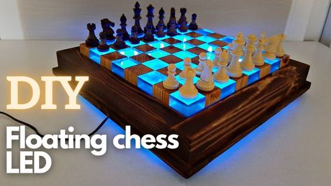 In this video we show how to make a Chess from Wood and Epoxy Resin with a floating effect and light. This chess is completely handcrafted with a minimum set of tools in the color mahogany. Wood burning. DIY. If you enjoy this video, Please Subscribe and share. We are appreciate all of the support. Wood Epoxy Table Led, Diy Resin And Wood Chess Board, Wood Projects With Epoxy, Epoxy Resin Chessboard, Floating Chess Board, Diy Chess Board Table, Wood And Epoxy Chess Board, Chess Board Table Diy, Wood And Resin Chess Board