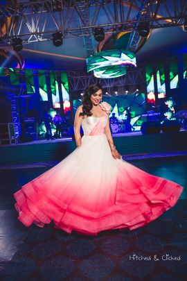 Stunning ombré one shoulder white and pink cocktail gown! | Ankur & Ridhi | WedMeGood|#wedmegood #cocktailgown #ombregown #westerngown #weddinggown #indianweddings Gowns Indian, Mom Daughter Matching Dresses, Cocktail Outfits, Ivory Outfit, Ombre Gown, Engagement Dress For Bride, Western Gown, Reception Gown, Designer Lehengas