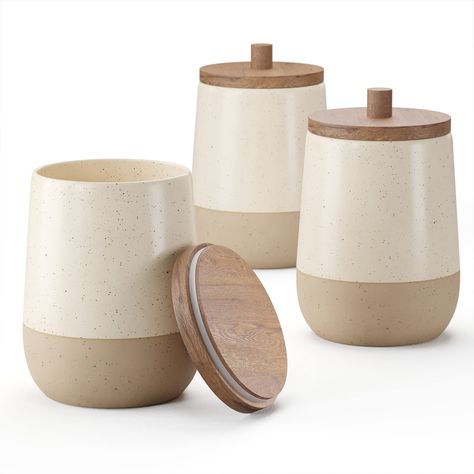 PRICES MAY VARY. Ceramic storage canister set - Organize your home in style with this beige ceramic storage canister set. These bathroom jars with lids make a perfect Qtip holder or cottonball holder. The ceramic jars are food safe and also work great for kitchen storage. Apothecary jars with wood lids - These ceramic jars Q tip holders make a striking countertop accent. The decorative jars will look chic and function perfectly as a cotton ball jar, cotton swab holder or storage container for ot Qtip Holder Bathroom Glass Jars, Canisters For Kitchen, Apothecary Jars Bathroom, Wood Lids, Cotton Ball Holder, Bathroom Jars, Bathroom Canisters, Vintage Canister Sets, Ceramic Canister Set