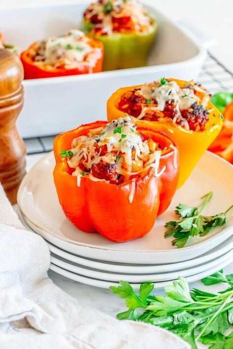 A lot of us grew up on stuffed peppers. They're hearty, tasty and endlessly versatile. You can select any color of peppers and adapt what you put in the filling. Meat and cheese are the obvious choices, along with rice to make them satisfying and filling. These Italian stuffed peppers are especially delicious with their Italian flavors such as Italian sausage, tomatoes, Italian seasoning, and plenty of mozzarella on top. They're nice served with hot garlic bread or a juicy watermelon feta salad. Italian Stuffed Peppers, Stuffed Peppers Recipe, How To Make Lasagna, Easy To Cook Meals, Watermelon Feta Salad, Watermelon And Feta, Juicy Watermelon, Feta Salad, Campfire Cooking