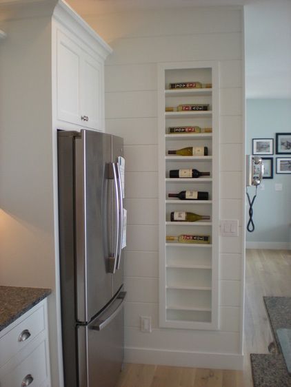 A creative way to store your wine is to make use of the space between the studs in your wall. But make sure your rack is built with a lip to keep the wine from rolling off the edge. Beach Style Kitchen, Wine Rack Design, Built In Wine Rack, Making Wine, Storage Racks, Kitchen Corner, Wine Racks, Trendy Kitchen, Cottage Kitchen