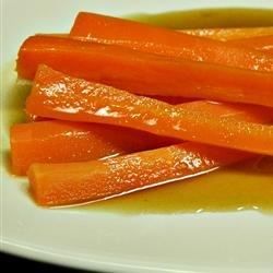 This sauce recipe can be drizzled over cooked carrots to make a terrific side dish at Thanksgiving, Easter, or any other time you have guests for dinner. Cream Sauce For Ravioli, Sauce For Ravioli, Amaretto Sauce, Spicy Pecans, Amaretto Cream, Ravioli Recipes, Butter Sauce For Pasta, Ravioli Sauce, Carrot Tops