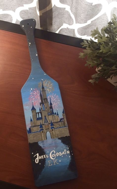 Disney castle sorority paddle #sigmakappa #disney #paddle #crafts #cinderella #sk #biglittle #BradleyUniversity #betanu #sorority #inspiration #fireworks #disneyworld #disney #castle Greek Life Paddles, Sorority Paddles Disney, Cute Sorority Paddles, Disney Sorority, Paddle Sorority Big, Fraternity Paddles, Big Little Paddles, Sorority House, Theta Phi Alpha