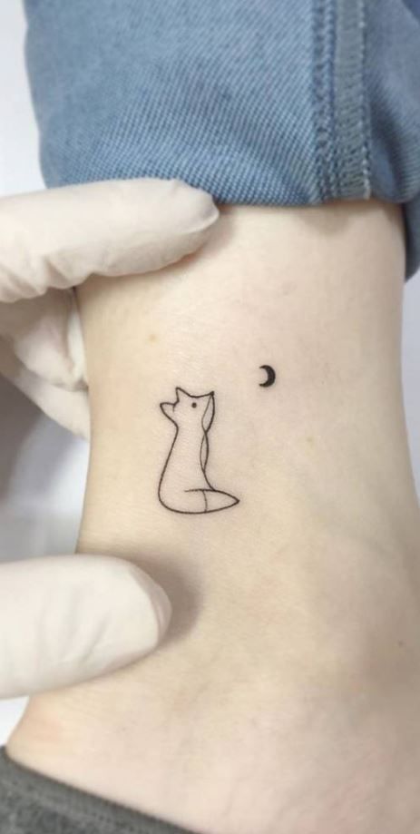 145 Captivating Fox Tattoos, Ideas, and Meanings - Tattoo Me Now Fox Henna Tattoo, Boho Fox Tattoo, Fox Rose Tattoo, Mother Fox Tattoo, Fox Finger Tattoo, Fox Ankle Tattoo, Small Fox Tattoo Men, Fox Silhouette Tattoo, Small Wolf Tattoo For Women Simple