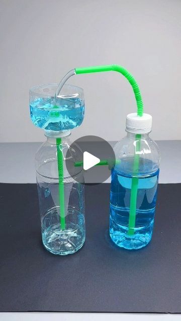 paper crafts creator on Instagram: "water transfer experiment with plastic bottle  #turnwasteintotreasure #handmadediy #parentchildhandmade #sciencesmallexperiment #letsplayhandmadetogether #diyexperiment #watertransfer #plasticbottlecraft #kidscrafts #funscience #handsonlearning" Things To Make From Plastic Bottles, Plastic Bottle Stem Project, Water Bottle Fountain, Things To Make Out Of Plastic Bottles, Craft With Plastic Bottles, Water Activities For Preschool, Bottle Crafts For Kids, Uses For Plastic Bottles, Water Experiments For Kids