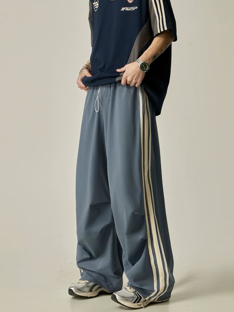 WN6257   ■size(cm)      Length   Hip     S   100   112     M   102   116     L   104   120     XL   106   124       ■model 174cm 61kg M ■material 90% polyamide fiber (nylon), 10% polyurethane elastic fiber (spandex) Track Pants Outfits, Casual Sport Outfits, Lazy Pants, Baggy Track Pants, Track Pants Outfit, Sporty Streetwear, Sporty Pants, High Heel Sneakers, Nylon Pants