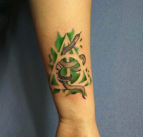 Slytherin Tattoo Ideas, Harry Potter Tattoo Unique, Slytherin Tattoo, Skyrim Tattoo, Hallows Tattoo, Dark Mark Tattoos, Crest Tattoo, Harry Tattoos, Feminist Tattoo