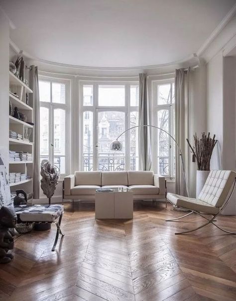 A contemporary Parisian living room with all whites and a hardwood parquet floor to soften the space Parisienne Apartment, Parisian Living Room, Glam Barbie, Modern Appartement, Modern Apartment Design, Interior Desig, Contemporary Apartment, Hus Inspiration, Best Interior Design