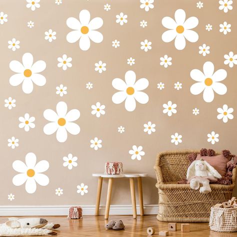 PRICES MAY VARY. Package Details: each purchase comes with 15 sheets of daisy stickers and decals, including 165 pieces of decals; The abundant amount of decals makes it easy for customers to creatively decorate large wall spaces or just add a touch of freshness to several rooms; Each sheet of flower wall decor is about 11 x 11.8 inches/ 28 x 30 cm, so please confirm the size before purchasing Beautifully Colored Design: the color of floral wall decals peel and stick is as shown in the picture; Daisy Wall Decor, Daisy Nursery, Playroom/living Room, White Flower Wallpaper, Daisy Wall, Large Daisy, Playroom Bedroom, Floral Wall Decals, Flower Wall Decals