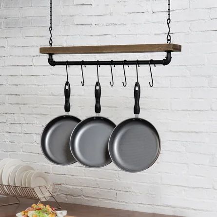 Williston Forge Ceiling Mounted Hanging Pot Rack With 8 S-Hooks | Wayfair Hanging Pot Rack, Pot And Pans Organization, Pan Organization, Pot Rack Hanging, Overhead Storage, Solid Wood Shelves, Kitchen Ceiling, Utensil Organization, Industrial Pipe