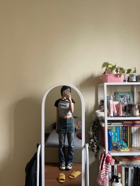 A mirror pic with a black - grey raglan crop top and denim skirt over flare jeans Skirt And Jeans Combo, Cropped Flare Jeans Outfit, Skirt Over Jeans, Flare Jeans Outfit, Skirt Jeans, Jeans Skirt, Cropped Flare Jeans, Cropped Flares, Jean Skirt