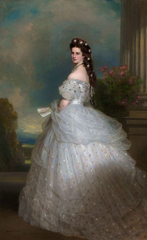 1865 – Sissi wearing an ball gown, believed to be created by Charles Frederick Worth, the most renowned dressmaker of the later half of the 19th century. Embroidered with precious stones and pearls, Sissi’s dress was made of white satin and tulle and is covered with thousands of silver foil stars shimmering throughout her dress. Sissi is crowned with her large braids, creating a natural diadem decorated with diamond edelweiss pins. The edelweiss was the emblematic flower of the Austrian alps. Fashion History Timeline, Franz Xaver Winterhalter, Istoria Modei, House Of Worth, Personaje Fantasy, Victorian Paintings, Seni Vintage, Seni Cat Air, Princess Aesthetic