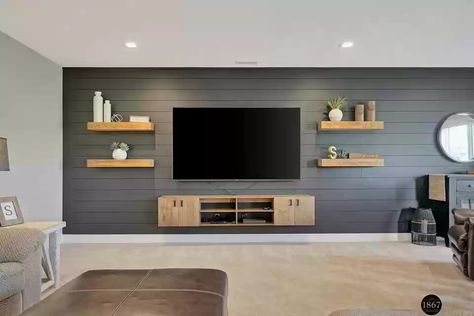 Living Room Shiplap Accent Wall With Tv, Accent Walls In Living Room Behind Tv, Tv Wall Design With Floating Shelves, Basement Tv Accent Wall, Dark Shiplap Wall Living Room, 70 Inch Tv In Living Room On Wall, Wood Accent Wall Living Room With Tv, Basement Accent Wall With Tv, Accent Walls In Living Room With Shelves