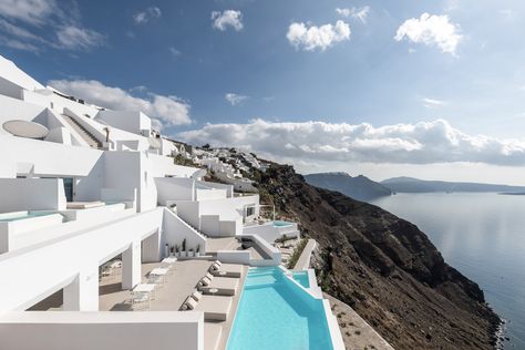 Saint Hotel on the coast of Santorini has rooms in white-painted caves Santorini Hotels, Hotel Entrance, Contemporary Hotel, Oia Santorini, Santorini Island, Urban Fabric, Building Structure, The Saint, Greek Island