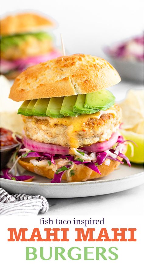 4 ingredient Mahi Mahi burgers made with fresh fish and then topped with your favorite fish taco toppings - cabbage, pickled onions, chipotle mayo, and avocado! They make an easy, delicious, and healthy summer burger recipe! - Eat the Gains #mahimahi #pescatarian #pescatarianrecipes #fishburger#fishrecipes Mahi Burger Trader Joe's, Trader Joe’s Mahi Mahi Burger, Mahi Mahi Burger Trader Joes, Pollo Pescatarian Recipes, Mahi Mahi Sandwich Recipes, Mahi Sandwich Recipe, Mahi Mahi Burger, Mahi Burger, Mahi Mahi Sandwich