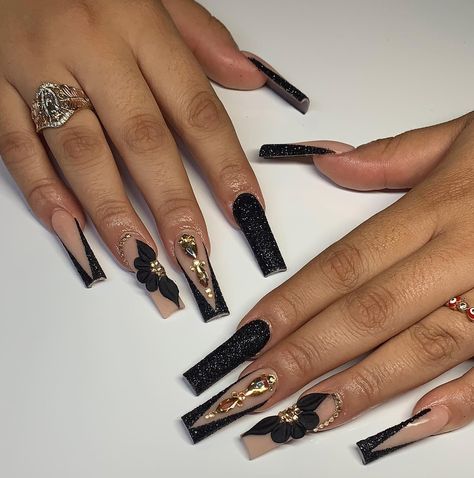 Glittery black slanted French tips with 3D flowers, gems, and rhinestones nail arts on long Sparkly Black Nails, Dance Nails, Hottest Nail Trends, Quince Nails, Black Gold Nails, Quinceanera Nails, Gold Acrylic Nails, New Years Nail Designs, Acrylic Toe Nails