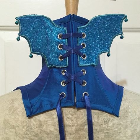 cute little bat wings Bat Wing Corset, Bat Wing Harness, Cosplay Wing Harness, Gothic Velvet Underbust Corset, Gothic Purple Corset With Corset Back, Bat Wings, Corsets, Medieval Fantasy, Peplum Top